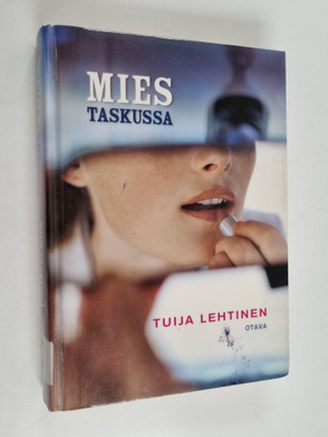 Tuija Lehtinen : Mies taskussa