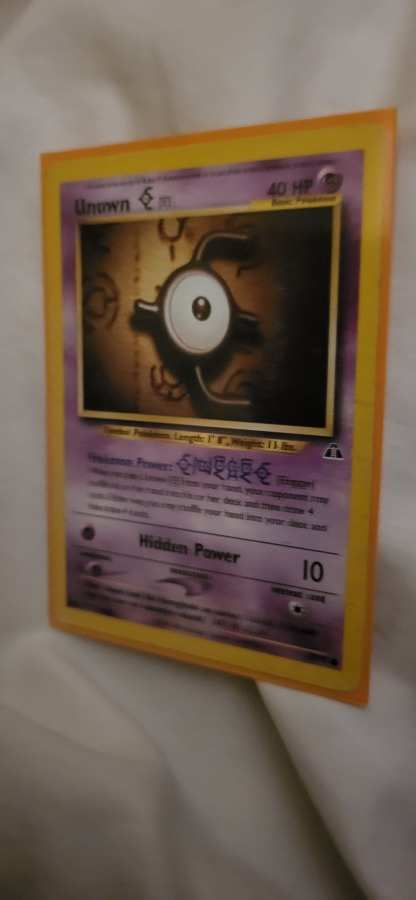 Unown [E] (NDI 67) Neo Discovery card