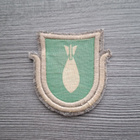 Huopapohjainen aselaji / hihamerkki kranaatinheitinmies - pikkukuva 1