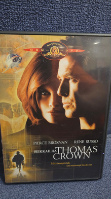 Seikkailija Thomas Crown (v.1999) Pierce Brosnan, Rene Russo