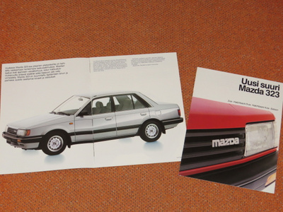 1986 Mazda 323 esite - KUIN UUSI - 18 sivua - suom