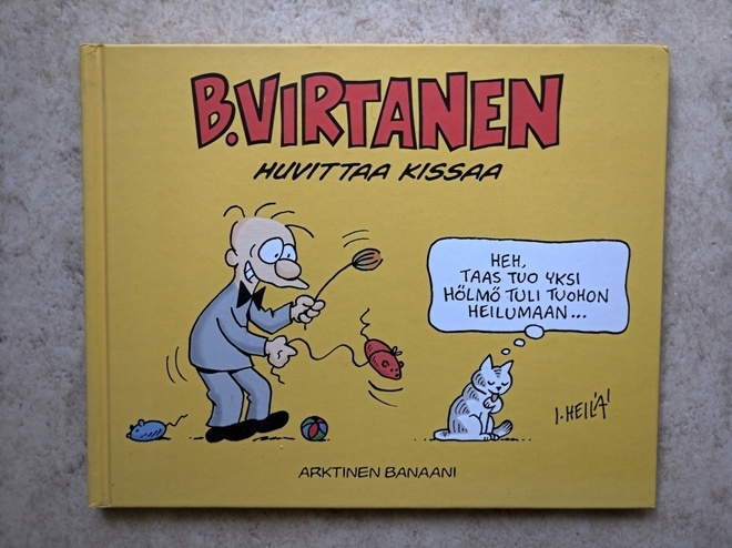 B. Virtanen huvittaa kissaa