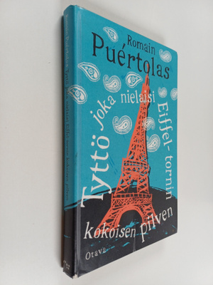 Romain Puertolas : Tyttö joka nielaisi Eiffel-tornin koko...