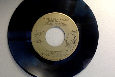 CONSUMER RAPPORT :: EASE ON DOWN THE ROAD : VINYL 7" US 1975