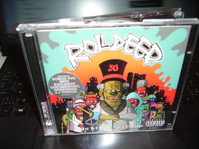 CD + DVD : ROLL DEEP : In at the Deep End ( sis. postik. )