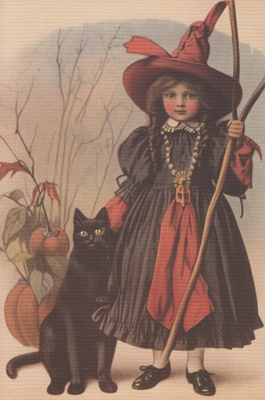 Halloween tyttö ja musta kissa