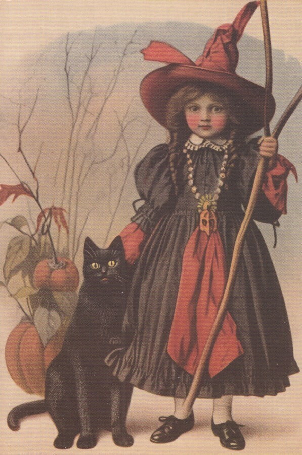 Halloween tyttö ja musta kissa
