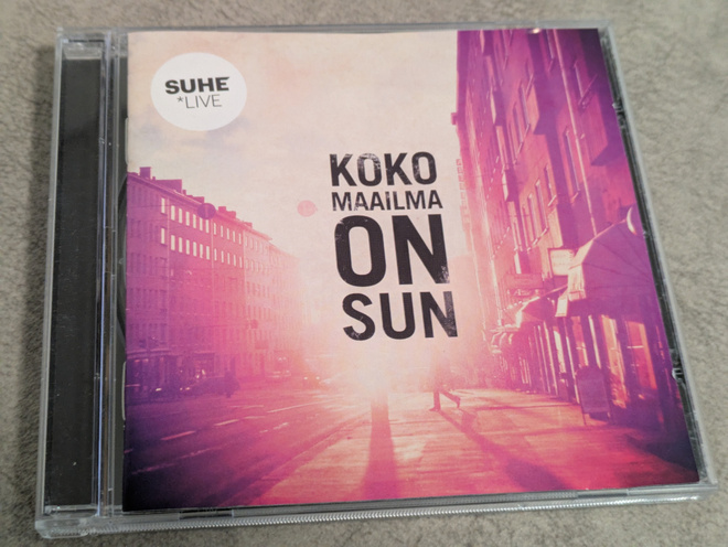 Suhe *Live - Koko Maailma On Sun (CD) KUIN UUSI!!