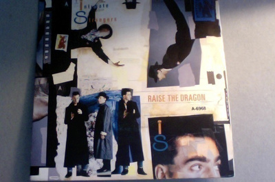 INTIMATE STRANGERS  ::  RAISE THE DRAGON :: VINYYLI 7"  1986