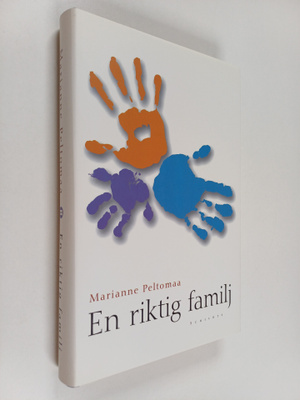 Marianne Peltomaa : En riktig familj (signeerattu)