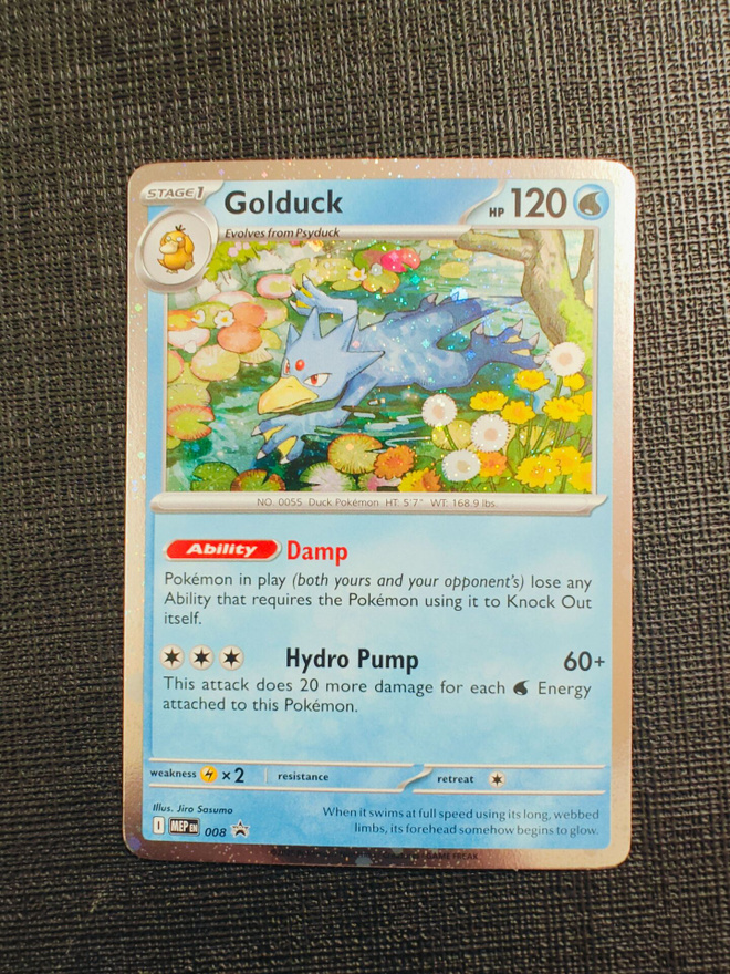 Golduck MEP008 Cosmos Holo Black Star Promo