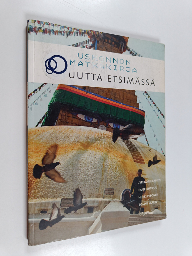 Jyri ym. Komulainen : Uskonnon matkakirja : Totuutta etsi...