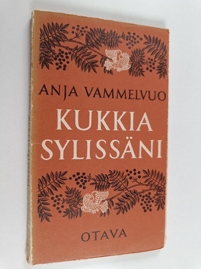 Anja Vammelvuo : Kukkia sylissäni : runoja