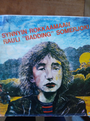 Rauli Badding Somerjoki : Synnyin rokkaamaan.