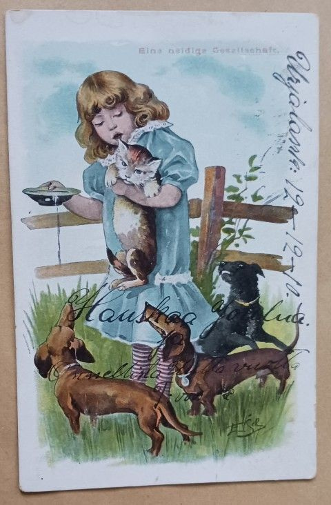 Tyttö, kissa ja mäyräkoirat, p. 1910