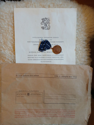 Jatkosodan muistomitali, myöntökirja ja kirjekuori
