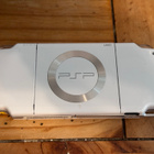 Sony PSP-2008 Slim & Lite + 4 peliä ja tarvikkeet - pikkukuva 4