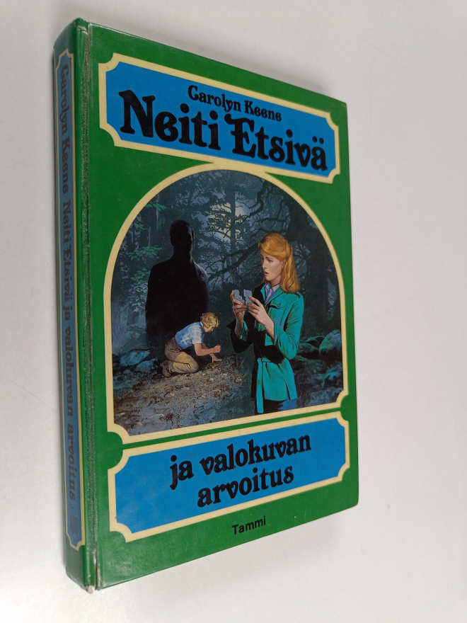 Carolyn Keene : Neiti Etsivä ja valokuvan arvoitus