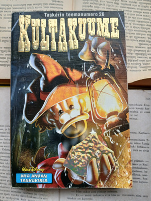 Aku Ankan taskukirja • teemanumero 26: Kultakuume
