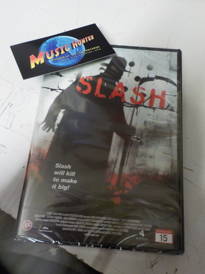 SLASH UUSI - korkkaamaton muoveissaan  DVD.