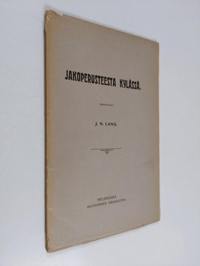 J. N. Lang : Jakoperusteesta kylässä