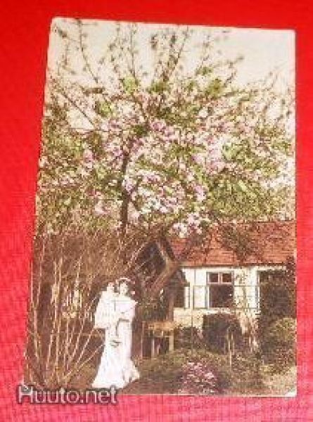 Lapsi äidin sylissä kukkivan kirsikkapuun alla  1914   (K9)