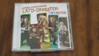 Herra Heinämäen Lato-orkesteri 15 vuotta munkkipossuna