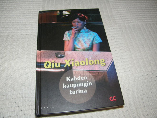 Qiu Xiaolong   Kahden kaupungin tarina