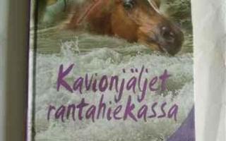 Hevoskirja Kavionjäljet rantahiekassa