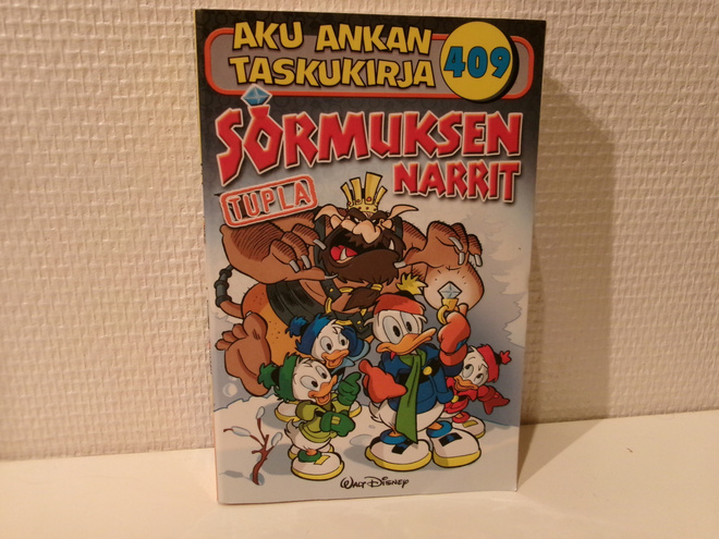 Aku Ankan taskukirja 409 Sormuksen narrit