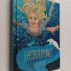 G. G. Elliott : Lasikaupunki - pikkukuva 1