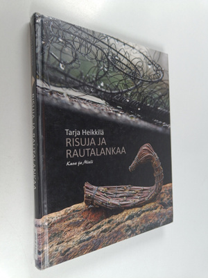 Tarja Heikkilä : Risuja ja rautalankaa