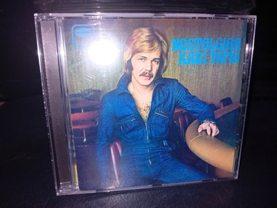 CD Kari Tapio : Nostalgiaa ( SIS POSTIKULU )
