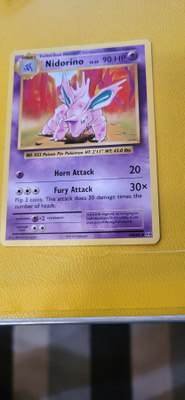 Nidorino (EVO 44) XY Evolutions CCG card