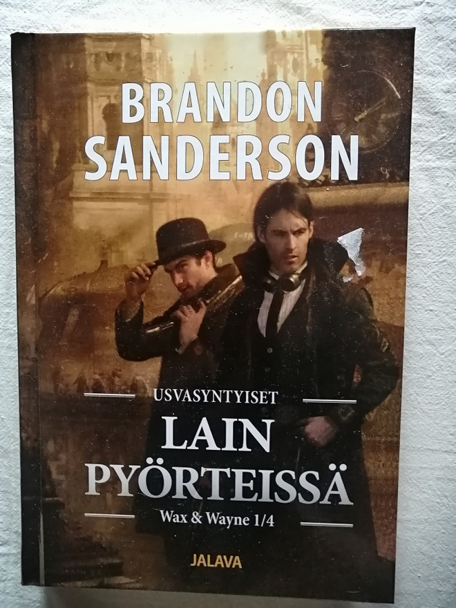 Sanderson, Brandon: Wax & Wayne 1: Lain pyörteissä (uusi)