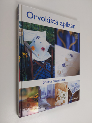 Caroline Birkett : Orvokista apilaan : sisusta ristipistoin