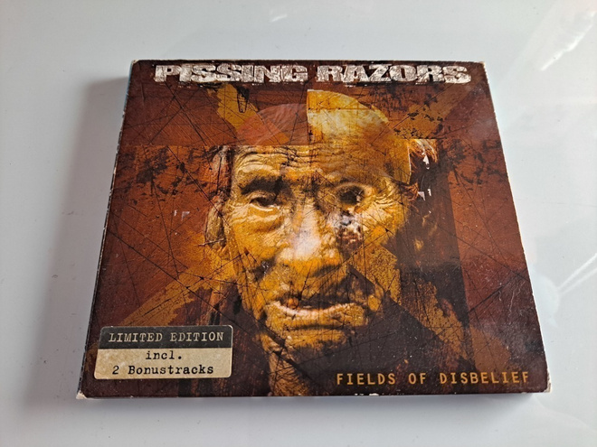 Pissing Razord Fields Of Disbelief Limited Edition (CD)