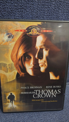 Seikkailija Thomas Crown (v.1999) Pierce Brosnan, Rene Russo