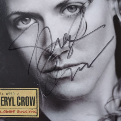 SHERYL CROW- Nimikirjoitus CD-vihkon kannessa