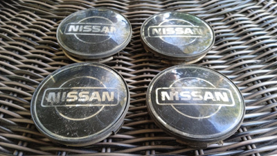 Nissan alumiinivanteiden keskikupit, 4 kpl