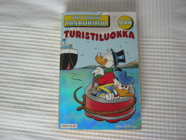 Aku-Ankan taskukirja 244, Turistiluokka