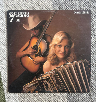 SÄVEL KIERTÄÄ MAAILMAA 7: Onnen päivät (LP) 1974