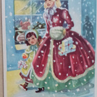 Äiti ja tytär jouluostoksilla lumen putoillessa, p. 1951 - pikkukuva 1