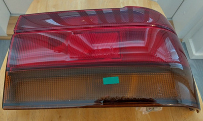 Mitsubishi IV Lancer C61A C62A OEM oikea takavalolyhty