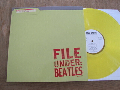 The Beatles File under beatles lp keltainen vinyyli uusi