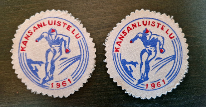 Kansanluistelu 1961 vintage kangasmerkki