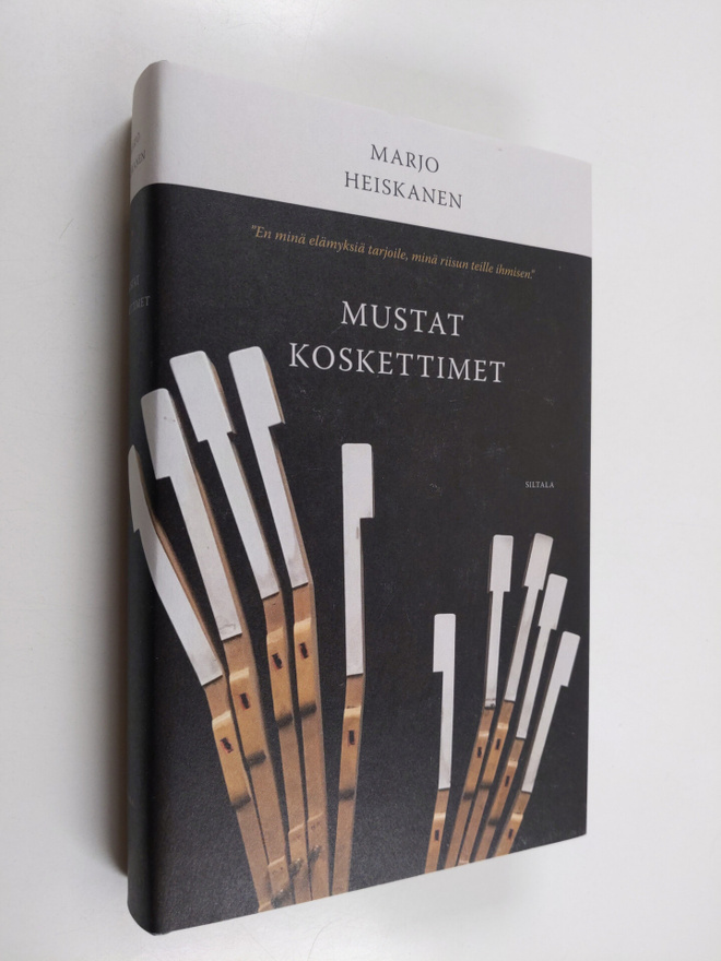 Marjo Heiskanen : Mustat koskettimet : romaani