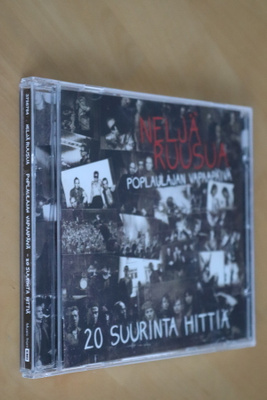 CD Neljä Ruusua : Poplaulajan vapaapäivä 20 suurinta hittiä