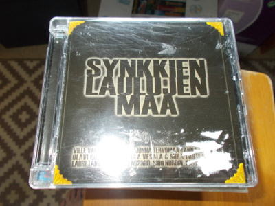 CD SYNKKIEN LAULUJEN MAA