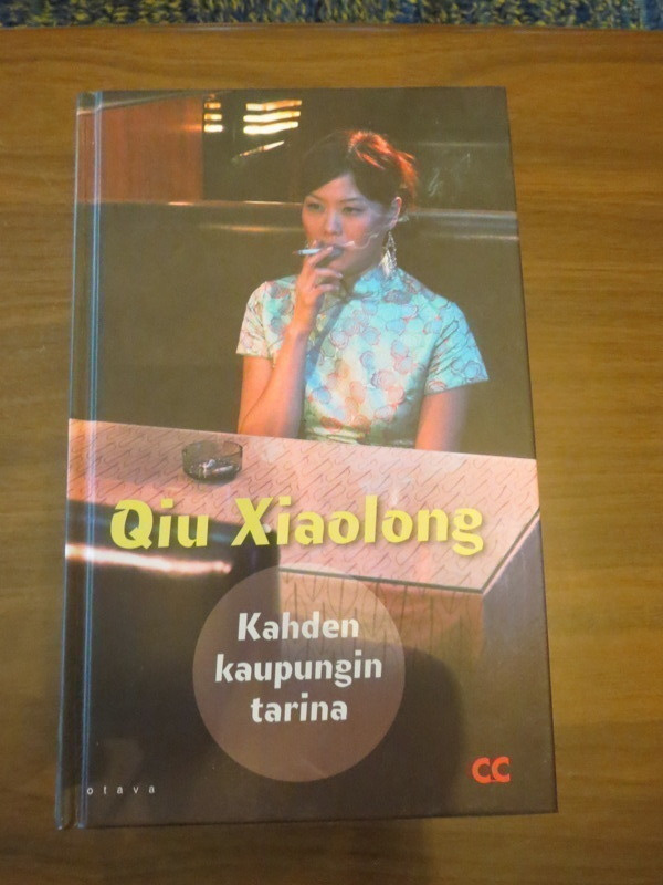 Qiu Xiaolong: Kahden kaupungin tarina